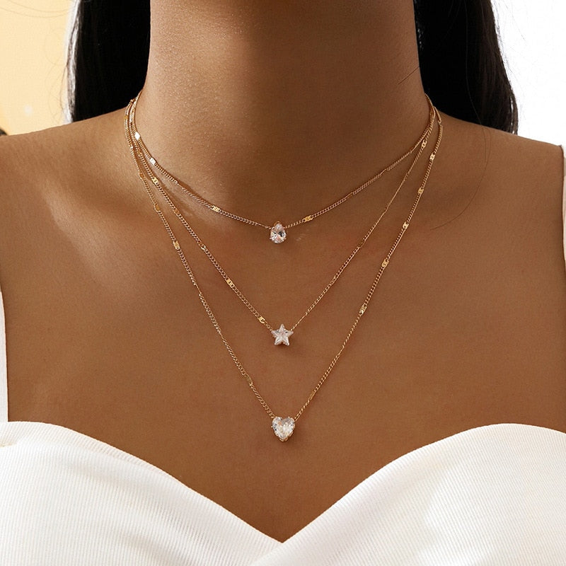 Conjunto de collar con dije de estrella y corazón