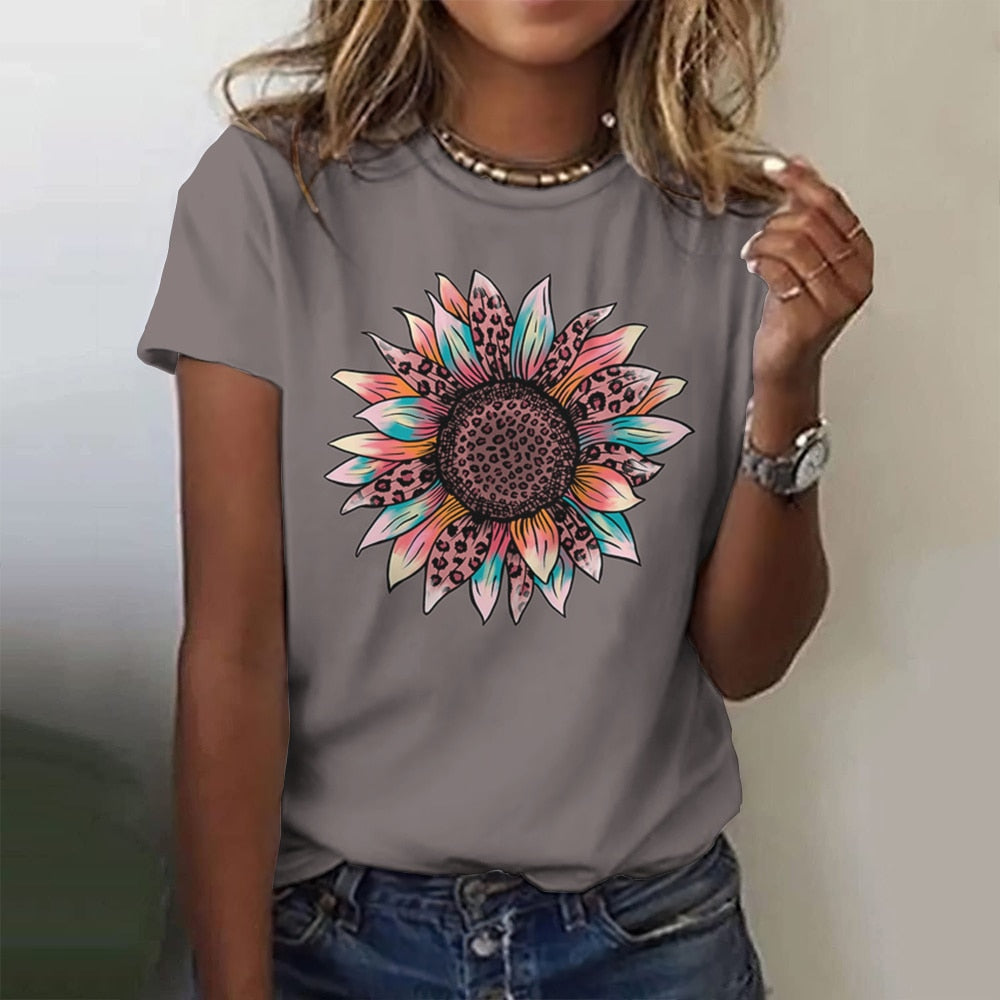 Camiseta de mujer con estampado de margaritas, manga corta.