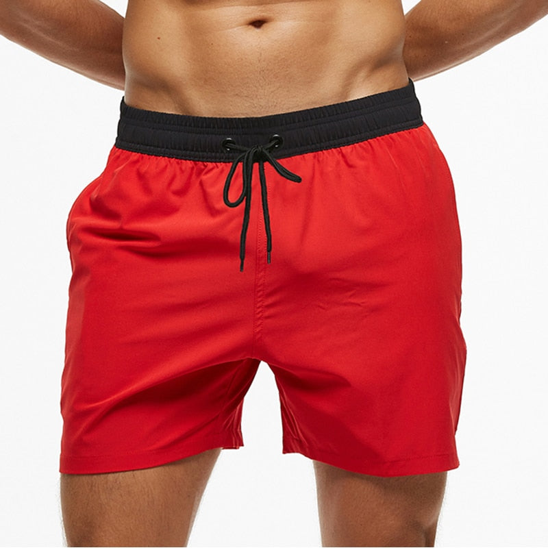 SHORT deportivo elástico para hombre.