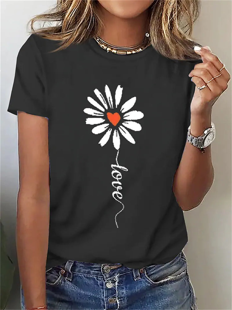 Camiseta de mujer con estampado de margaritas, manga corta.